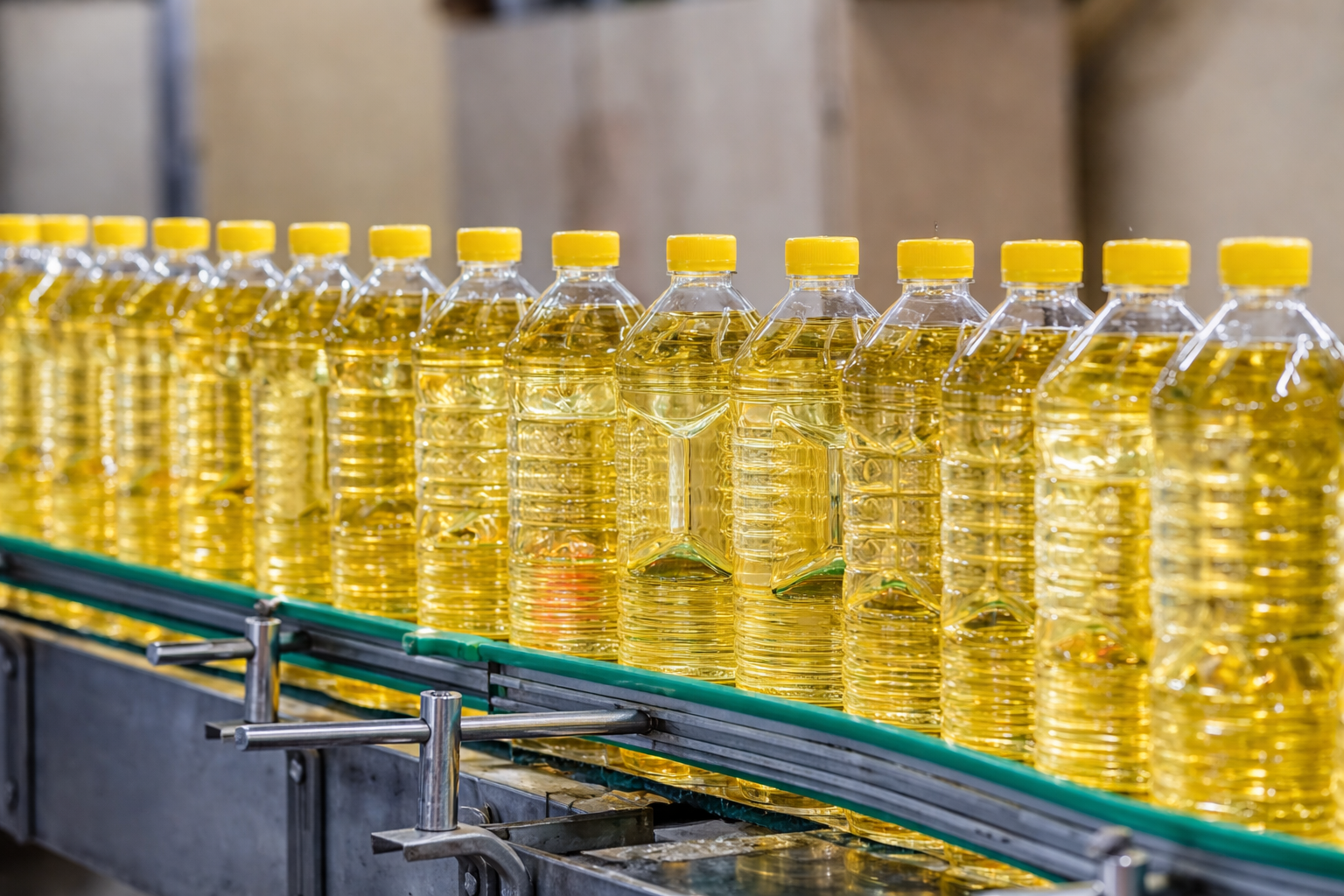 Bottles of oil on conveyor belt